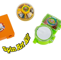 Product photo of colorful “Spin Art Kit” toys: a lime-green spin-art machine, a round paint-and-supply wheel, and part of an orange case on a white background; playful, bright tone.