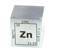 Metal cube with zinc label on a white background