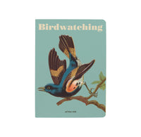 Blue notebook with title "Birdwatching" and an image of a bird standing on a branch