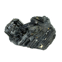 A black mineral specimen on a white background