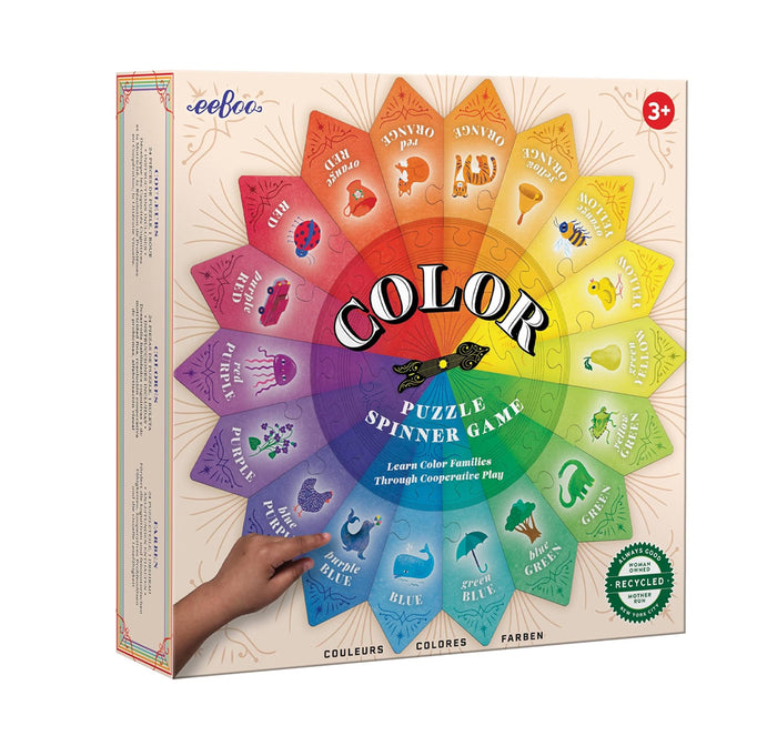 Color puzzle spinner game packaging with rainbow design and eeBoo branding.