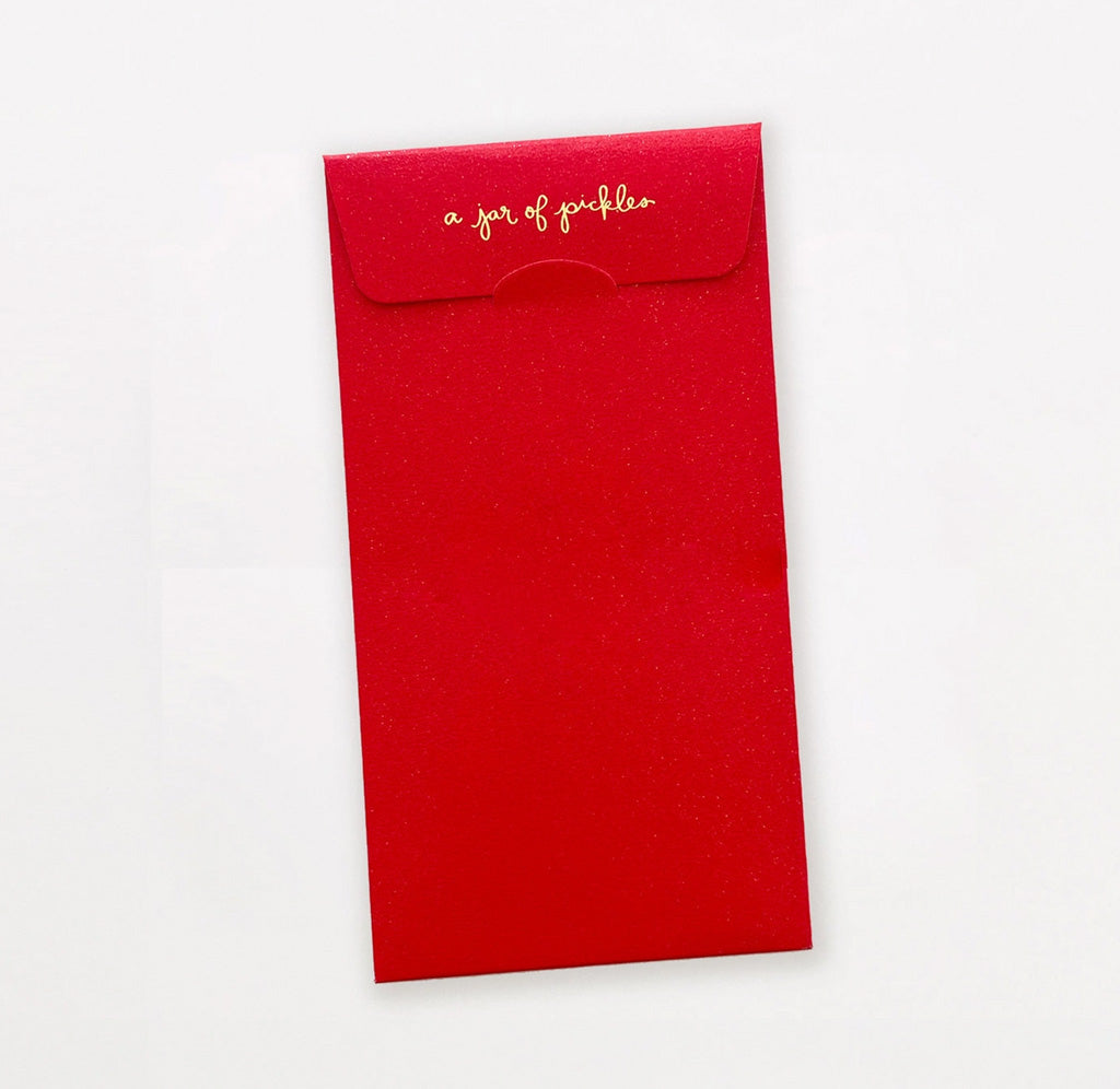 red envelope back with "a jar of pickles" on the flap on a white background.