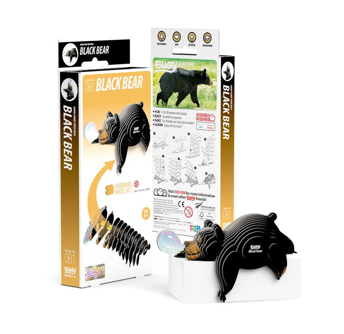 Black bear model kit with packaging and assembly instructions on a white background