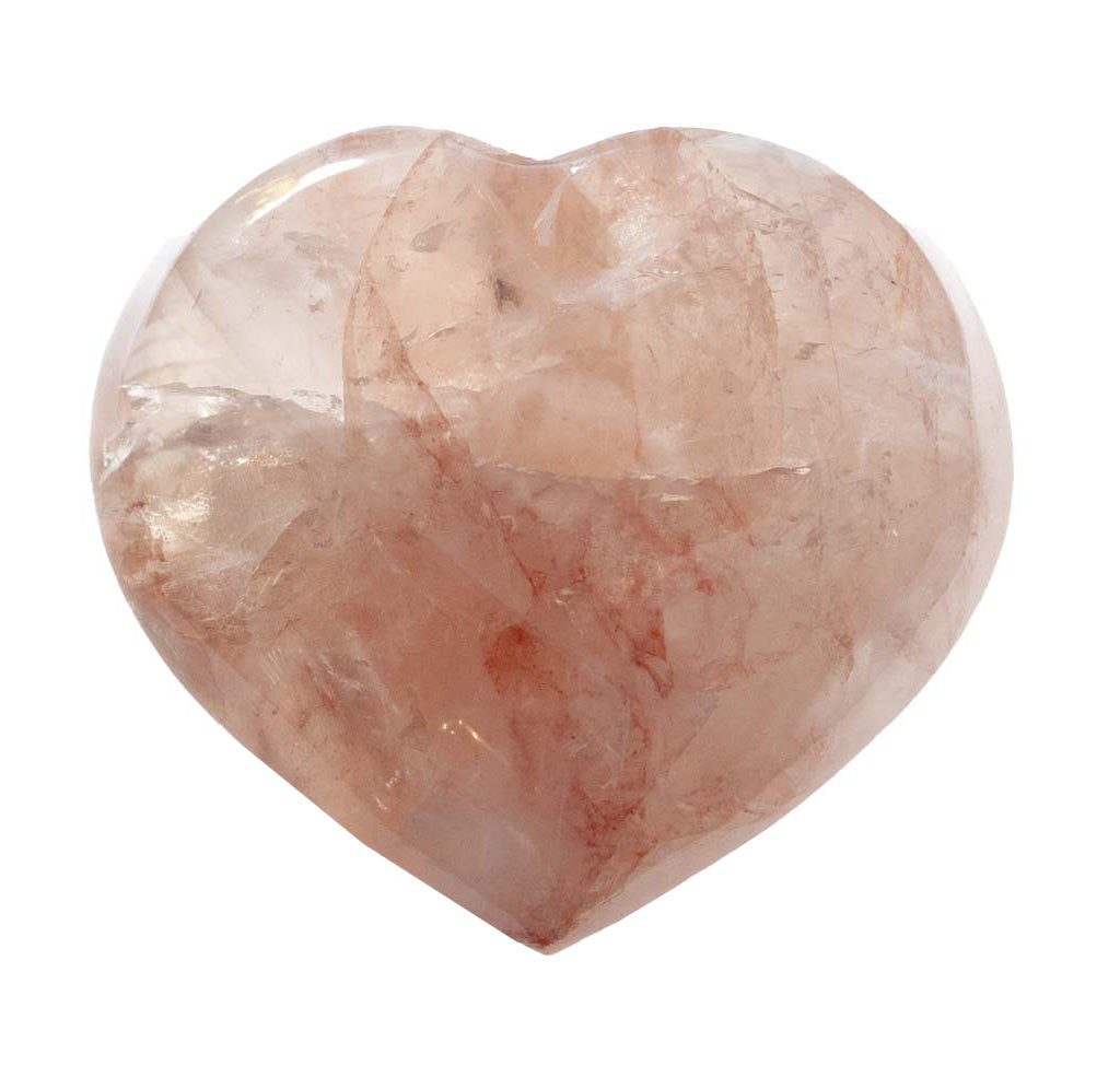 Heart-shaped pink stone on a white background
