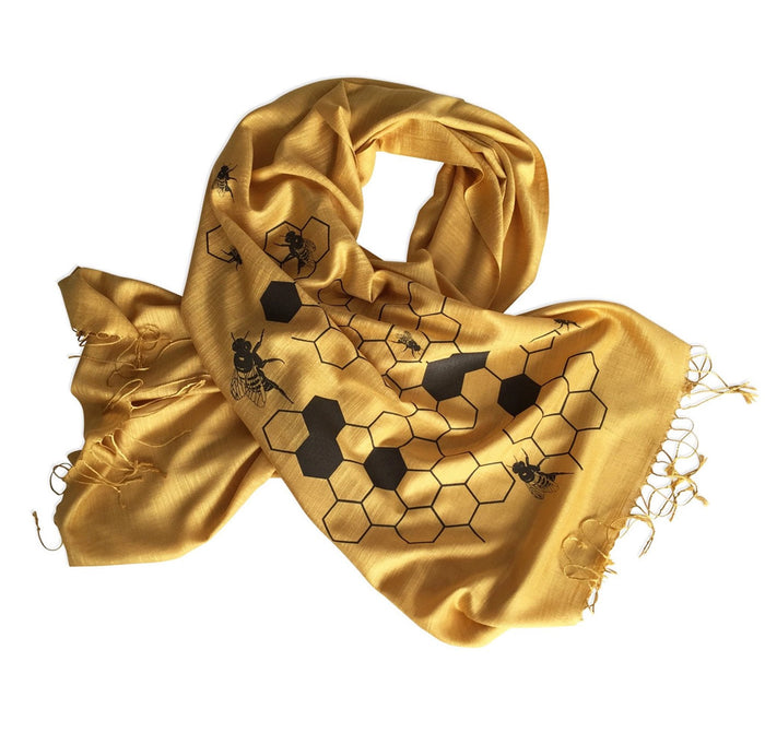 Gold scarf with brown honeycomb and bee pattern on a white background