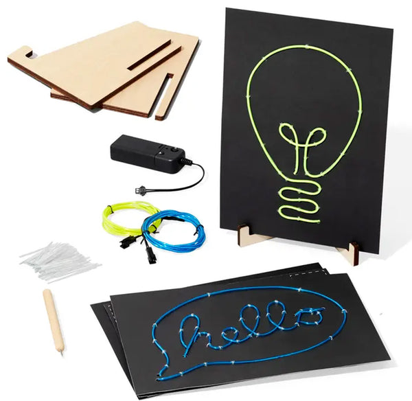 Drawing kit with blackboards, pens, and cables on a white background