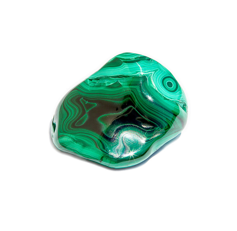 Green malachite stone on a white background