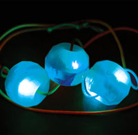 Glowing blue lights on a black background