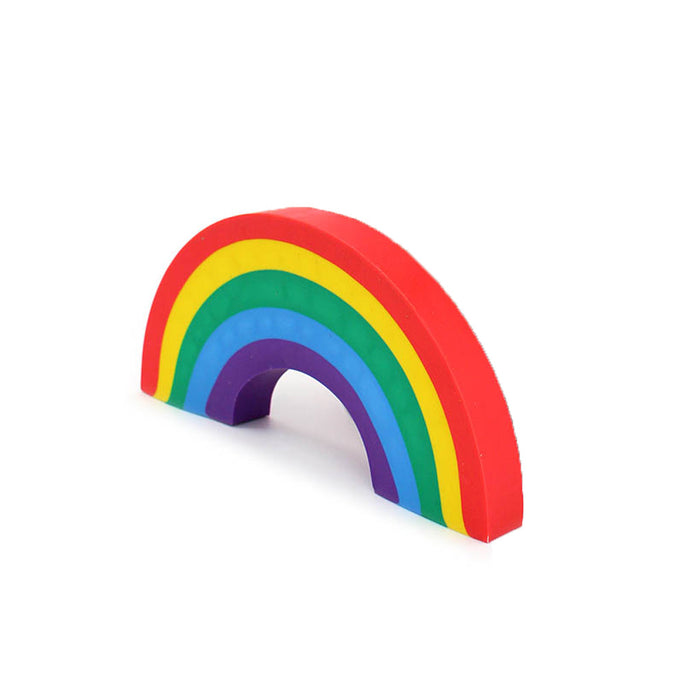 Colorful rainbow-shaped object on a white background