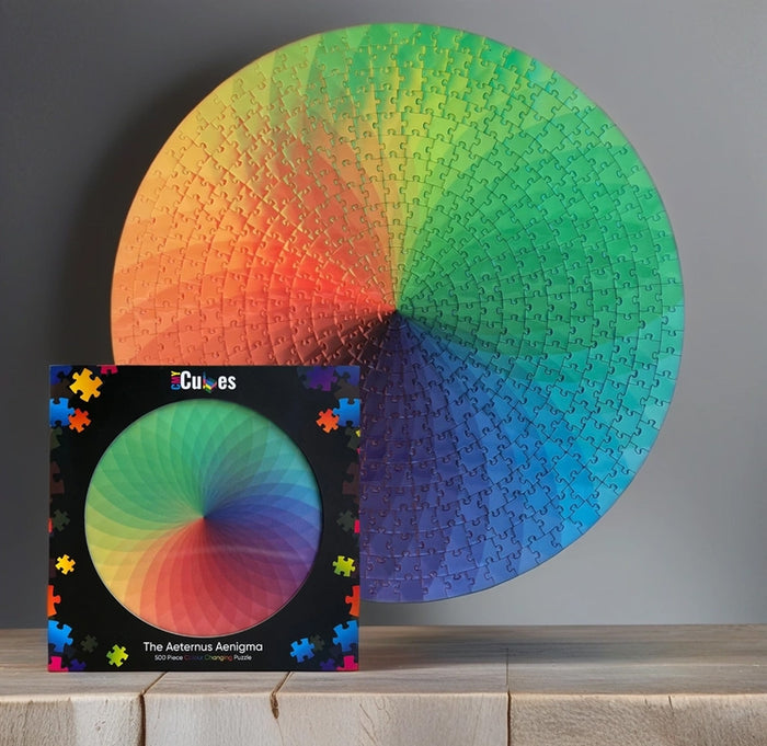 Colorful circular puzzle with a box in front on a wooden surface.