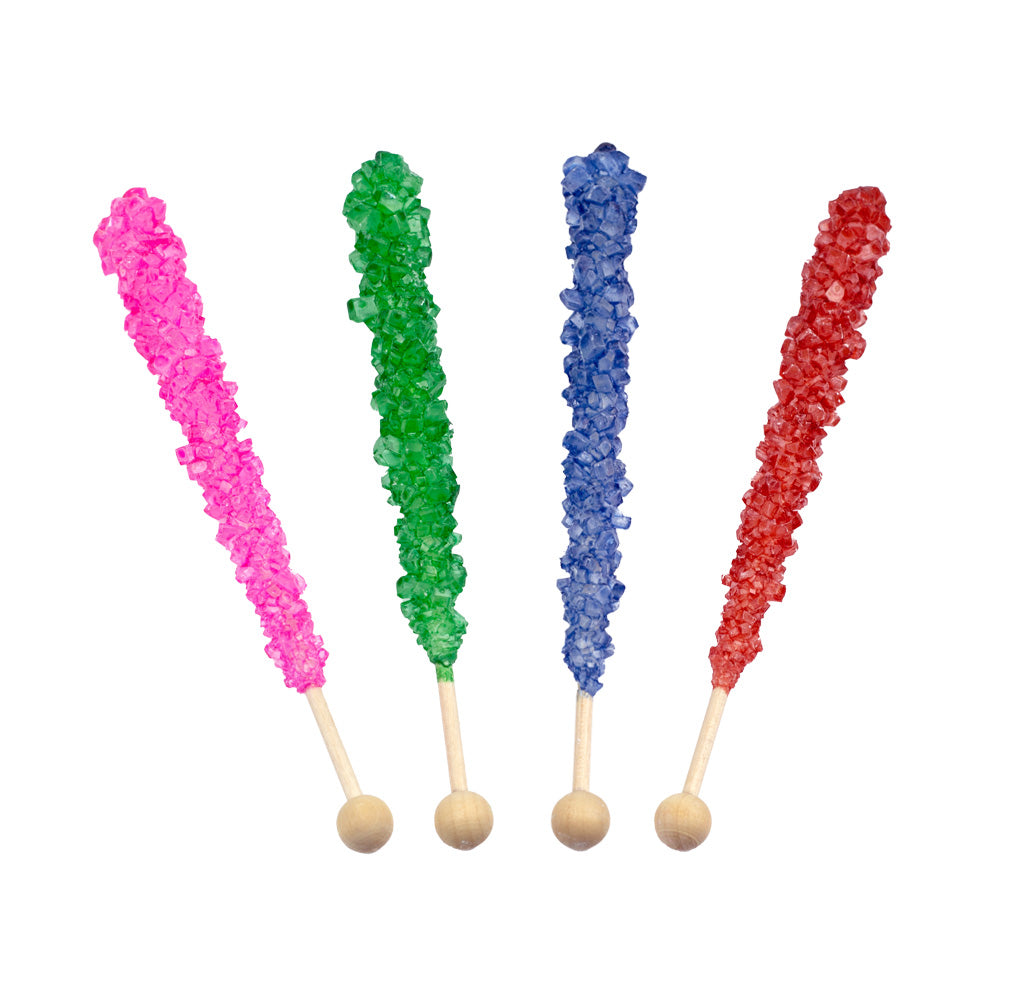 Four colorful rock candy sticks on wooden sticks against a white background