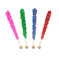 Four colorful rock candy sticks on wooden sticks against a white background