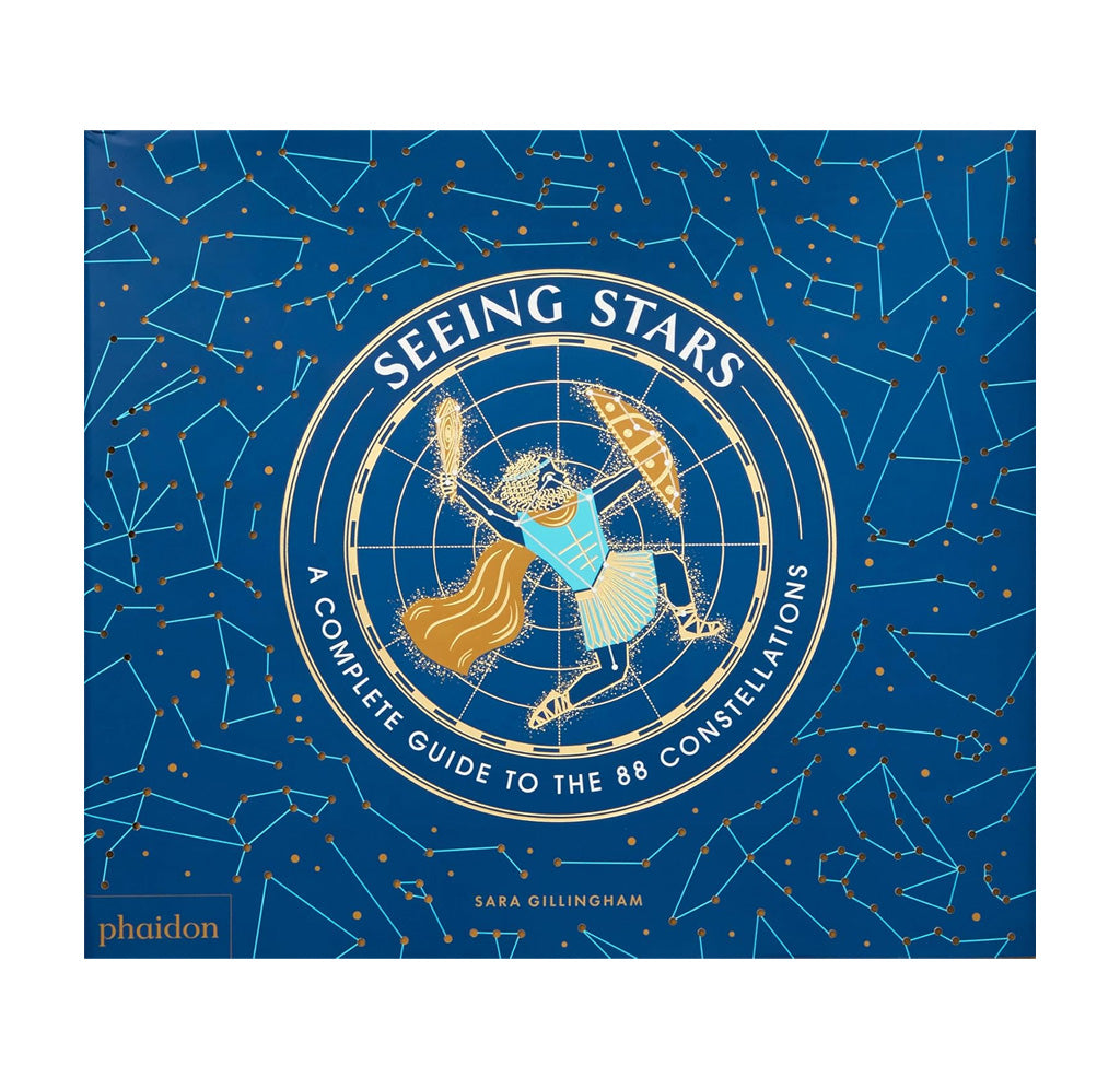 Book cover of 'Seeing Stars' with celestial design on a blue background