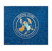 Book cover of 'Seeing Stars' with celestial design on a blue background