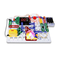 Electronic circuit board with various components on a white background