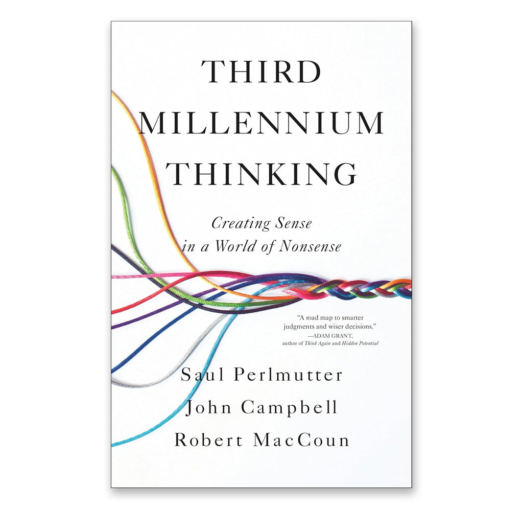 A multicolor bracelet consisting of multiple colored strands is being braided.