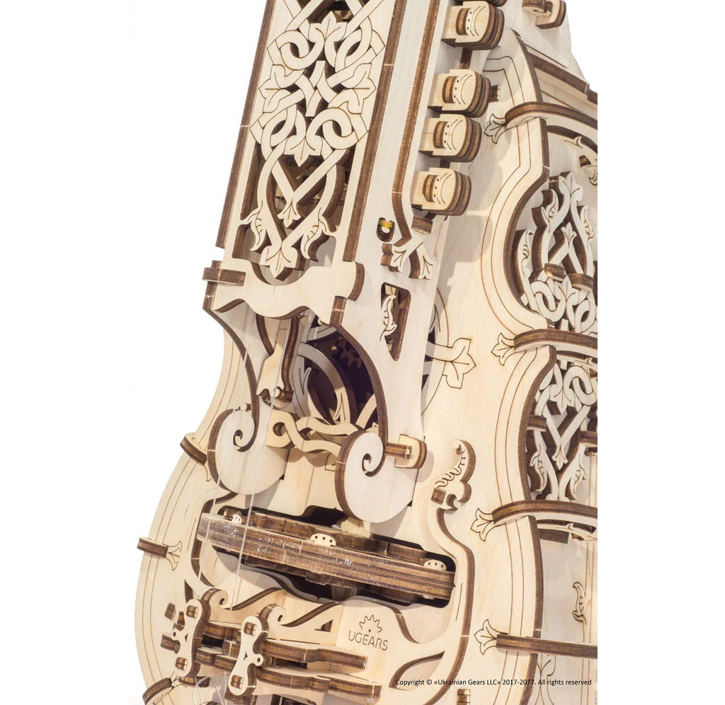 Close up shot of the middle of the Hurdy-Gurdy, showing the detailed woodwork and construction.