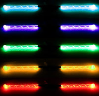 Set of colorful LED light sticks on a dark background