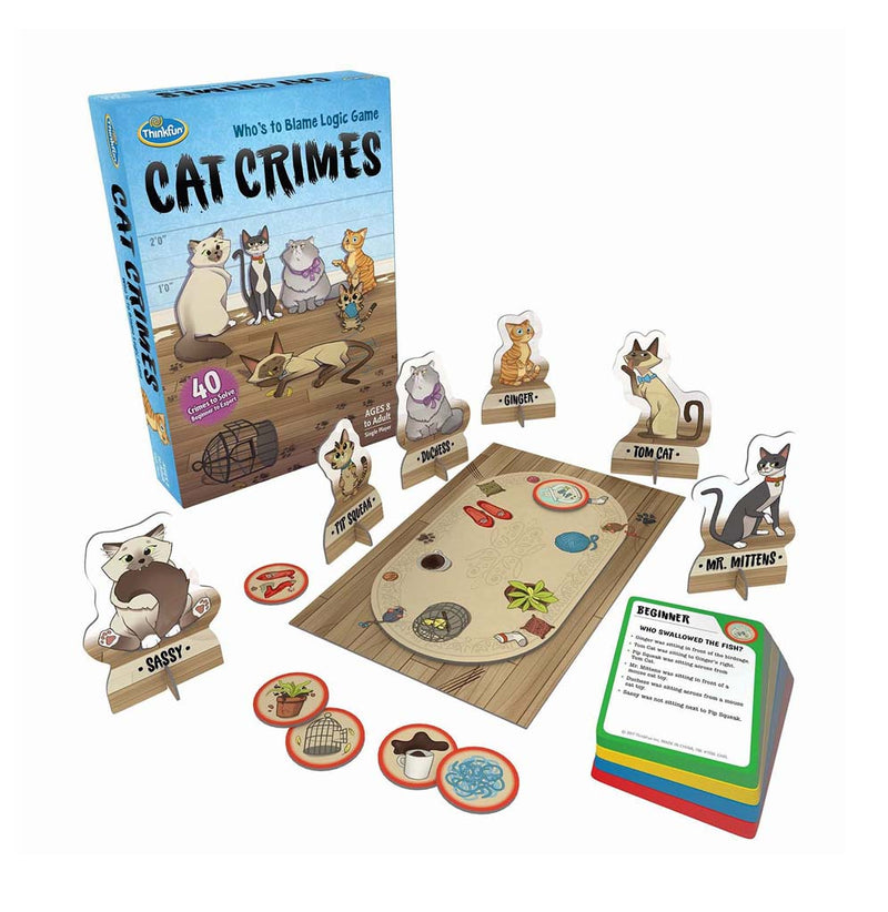 The game is set up for play. Six cats sit around a gameboard, challenge cards, and crime tokens. The box is 9.25" x 6.25". 