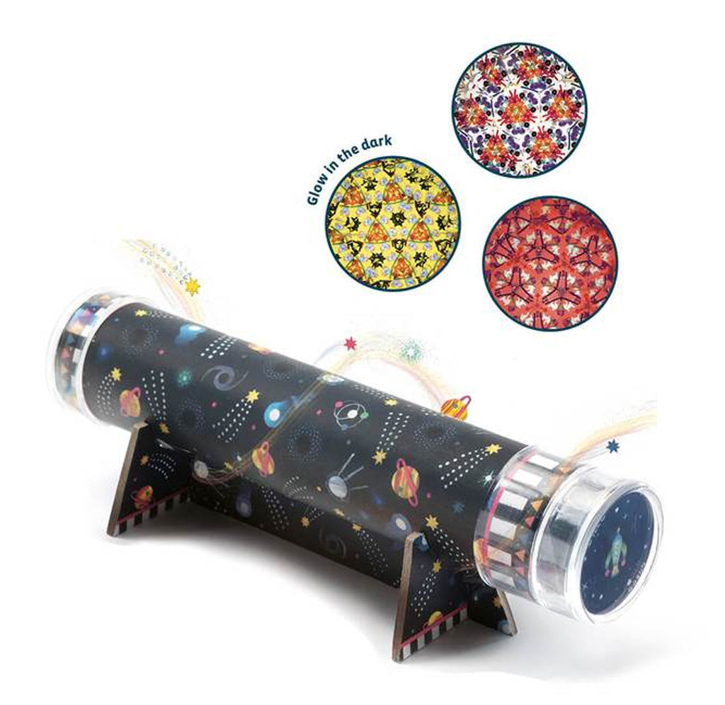 Kaleidoscope wrapped in dark blue space-themed paper. Three space-themed disks show the kaleidoscope design. 