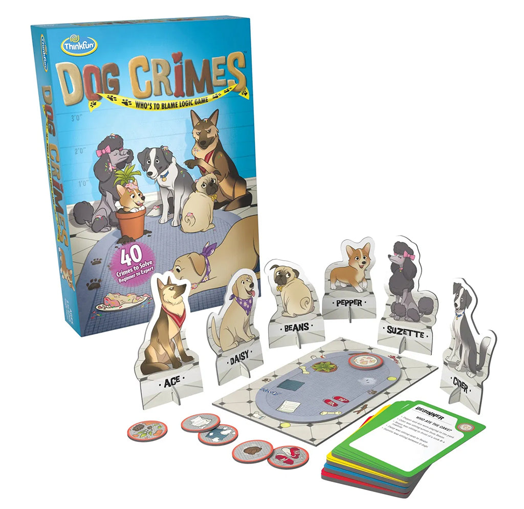 Six dogs of different species sit around a game board set up for play with tokins and game cards. The blue game box with the dogs illustrated images humorously accusing each other of the crime sits to the left.