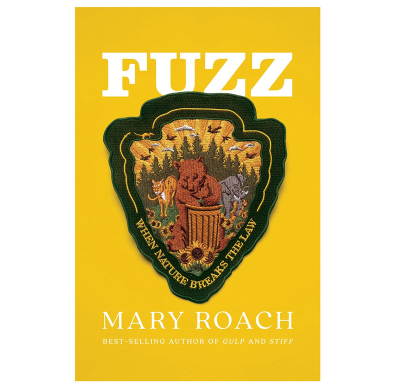 A yellow book cover for "Fuzz: When Nature Breaks the Law" by Mary Roach has a nature scout arrowhead-shaped emblem depicting animals in the wild.