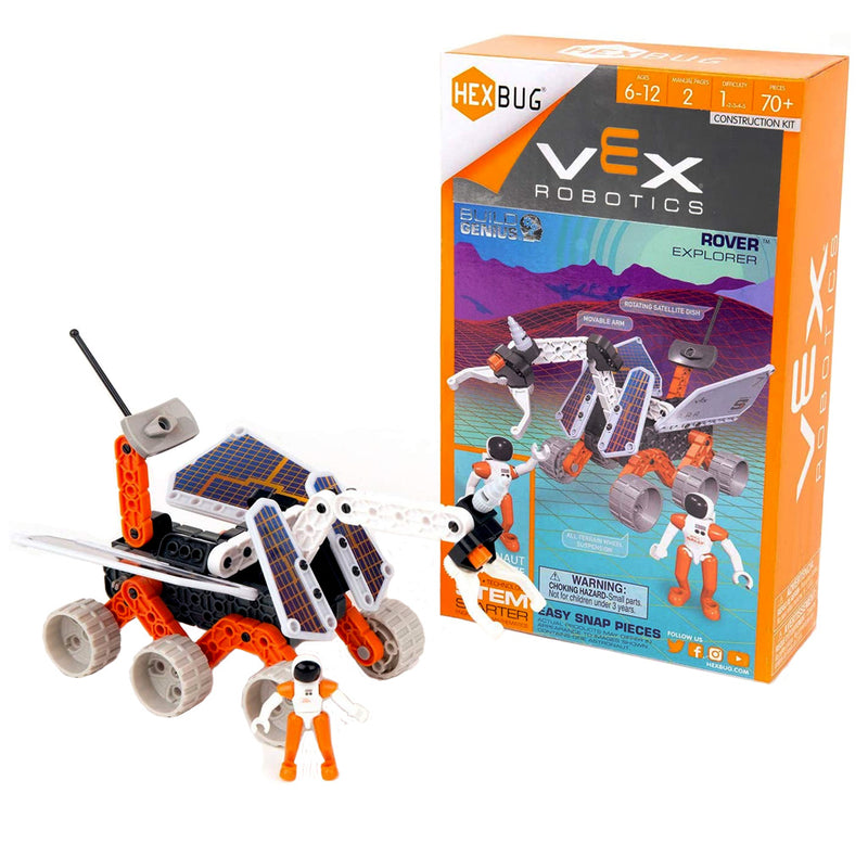 An orange and white space terrain vehicle with solar panels on the top and front An astronaut in an orange suit and white helmet stands in front of the vehicle. The blue, purple and orange product box shows a similar scene.