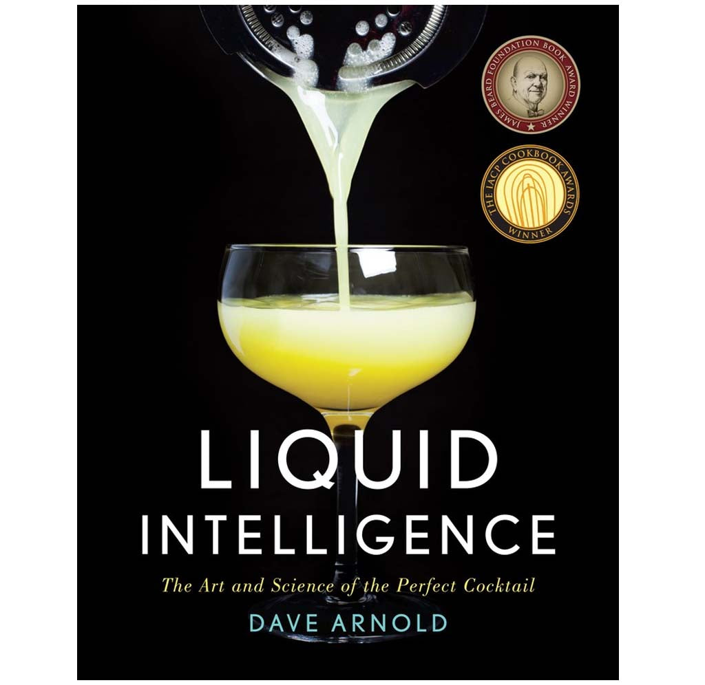 "Liquid Intelligence" is a hardcover book with a black cover; a pitcher is pouring a yellow liquid into a cocktail glass.