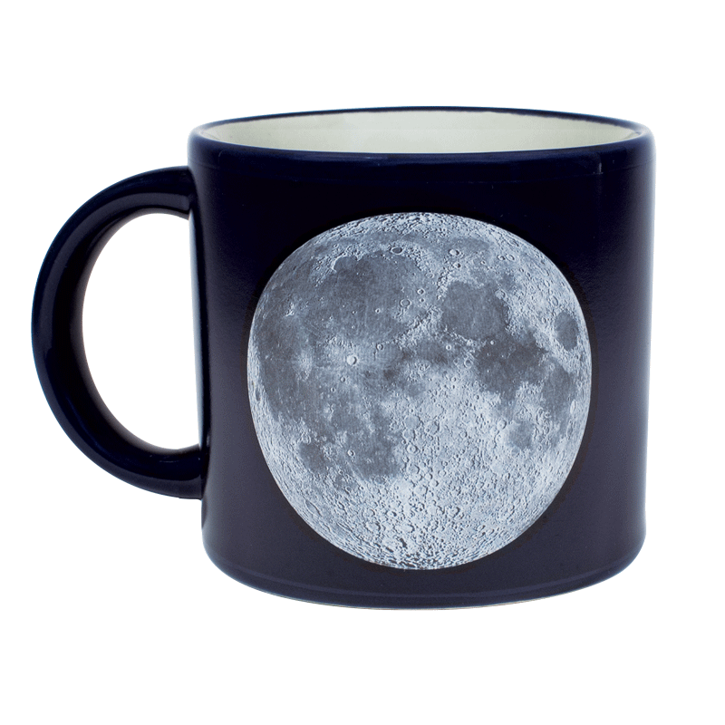 Giff image. When the mug is cold, the Moon is set against a sea of black. Add a steaming beverage, and then the mug transforms, revealing the names of the Appolo missions, astronauts, landing sites, and milestones.