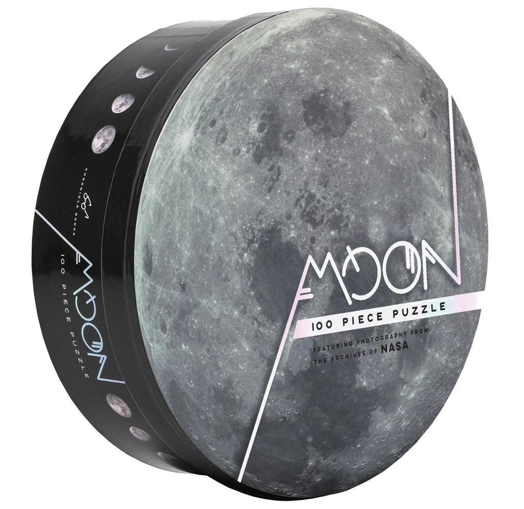 A round black container with moon phases along the edge and a large moon image at the center.