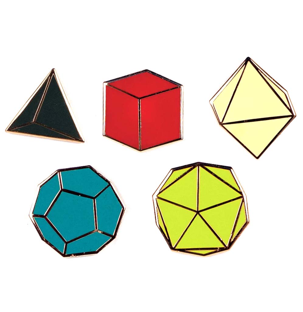 Set of 5 enamel pins in solid colors and golden lines. Red cube, black tetrahedron, cream octahedron, turquoise dodecahedron, neon yellow icosahedron.