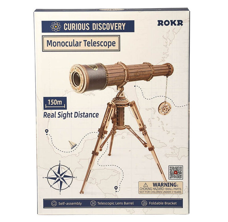 The box for the telescope kit is white and blue with the built telescope on the cover.