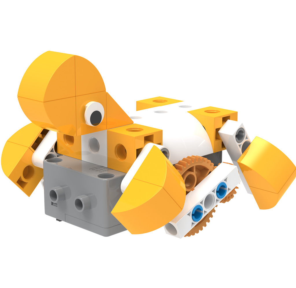 A yellow, grey, and white robotic turtle. 