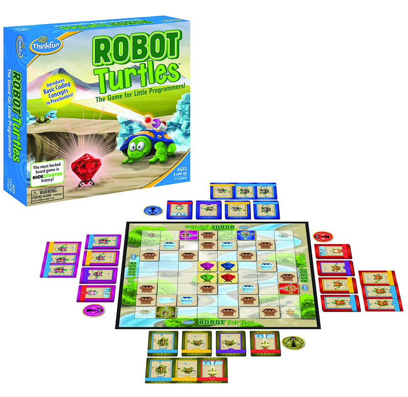 The game board is set up with the game box; A turtle sits in an outdoor scene about to capture the coveted red jewel. The game board consists of bright colors of purple, blue, green, and red.