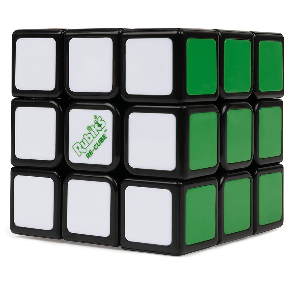 A 3x3 cube with different colored squares of green and white.