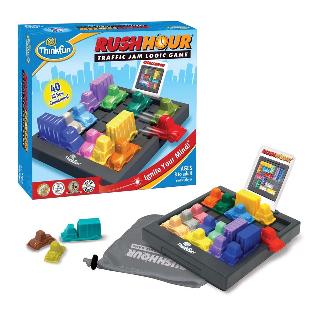 The game is set up for play next to the game box; there are all different types and colored cars sitting on a gray gride, and the game challenge card sits on the gride for easy reference. The box cover reflects the same scene.