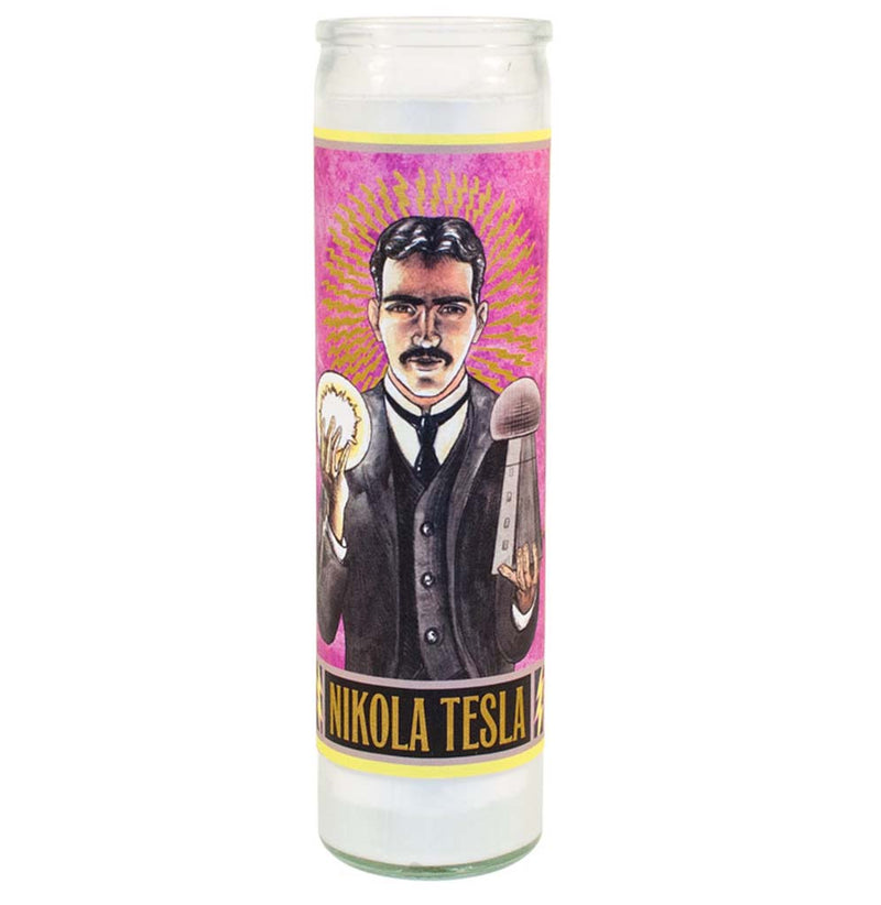 An 8-inch white candle with an illustrated image of Nikola Tesla on the front. He holds a lighted glowing orb in one hand and a statue of his World Wireless System in the other. Electric pulses emanate from his head, and his name appears at the bottom in yellow against a black background.