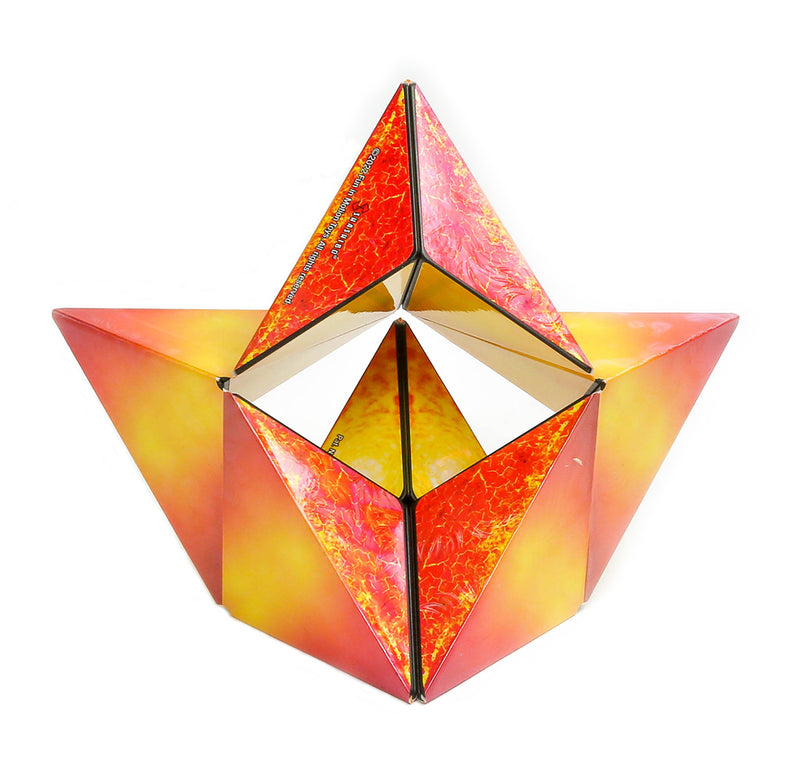The solar Shashibo is set up in a triangular design with three sides showing different aspects of the sun radiating rays in yellows, oranges, and reds.  