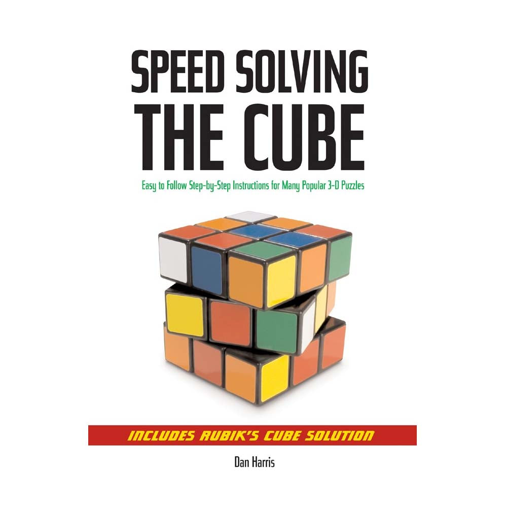 "Speed Solving The Cube" is a small white paperback book with an unsolved Rubik's cube on the cover set to show the 3x3 structure. 