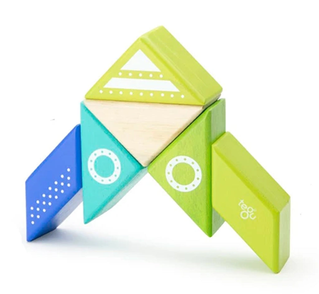 Shades of green, blue, teal, and natural in triangles and parallelograms create a rocket.