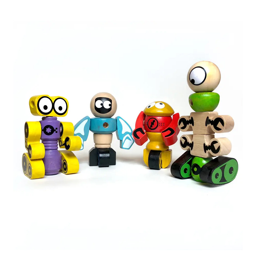 Four brightly colored eco-friendly retro-looking wooden robots in various shapes and sizes. 