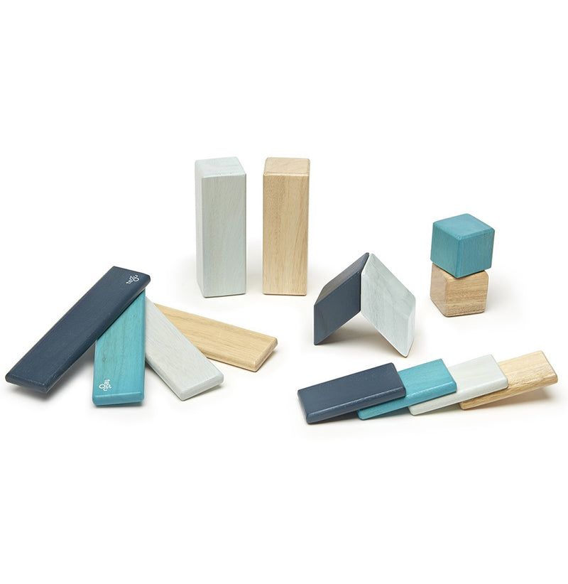 The Tegu wooden blocks are three shades of blue and one nature with no color. There are two sizes of planks, two triangles, two square blocks, and two rectangular blocks.