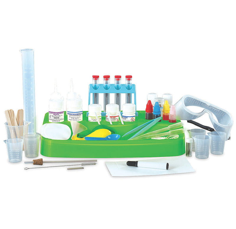 Various science-related tools are represented for experimenting with, such as test tubes, beakers, safety goggles, dyes, and a funnel.