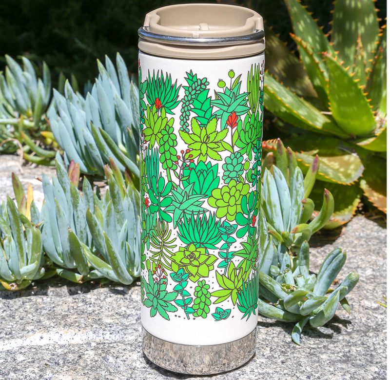 A tall, slender white water bottle with a beige lid and plants of many shades of green wrapped around the outside.