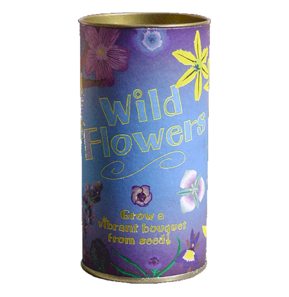 A 4"x 5" round canister of mixed wildflowers. The label looks similar to a watercolor painting in appearance—a blue and purple background with several different wildflowers in yellows, blues, white, and pink.