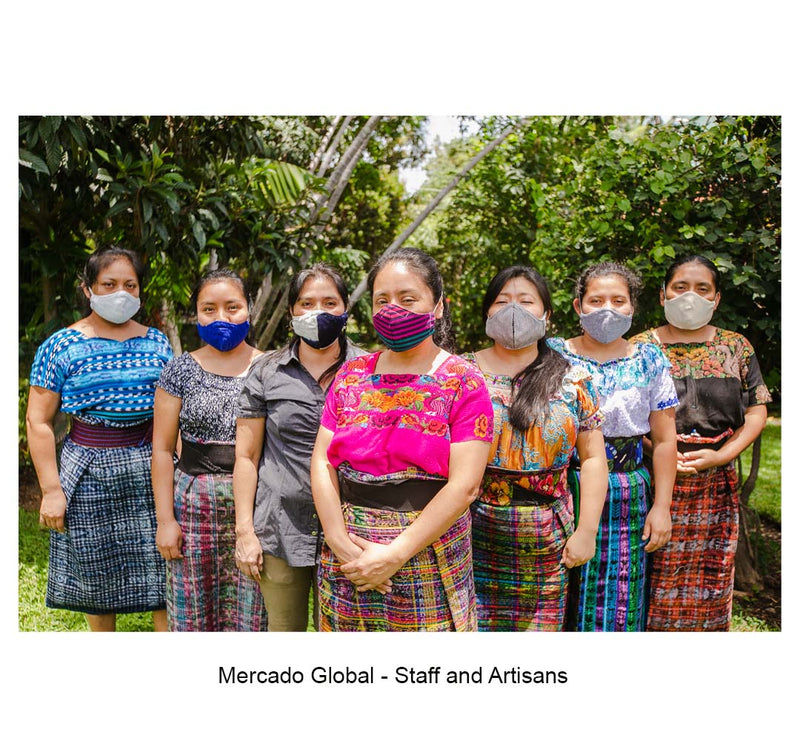 Seven woman wearing COVID-19 masks.